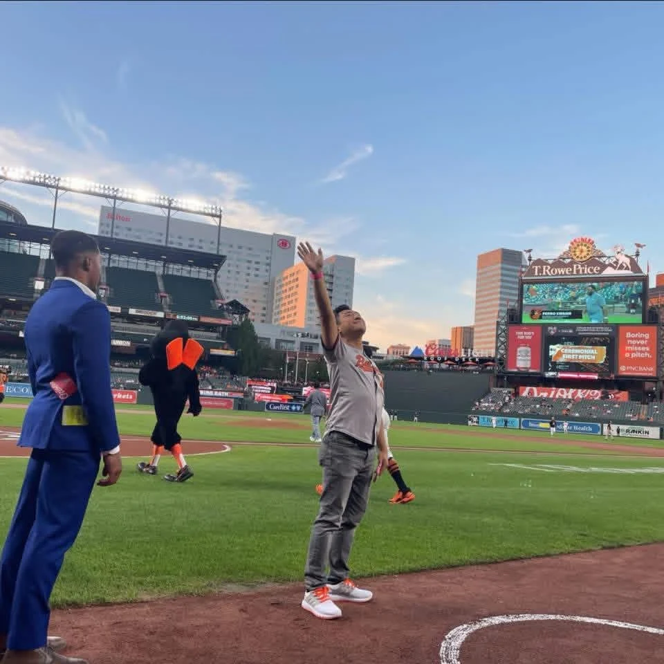Yong waving on the field at Camden Yards
